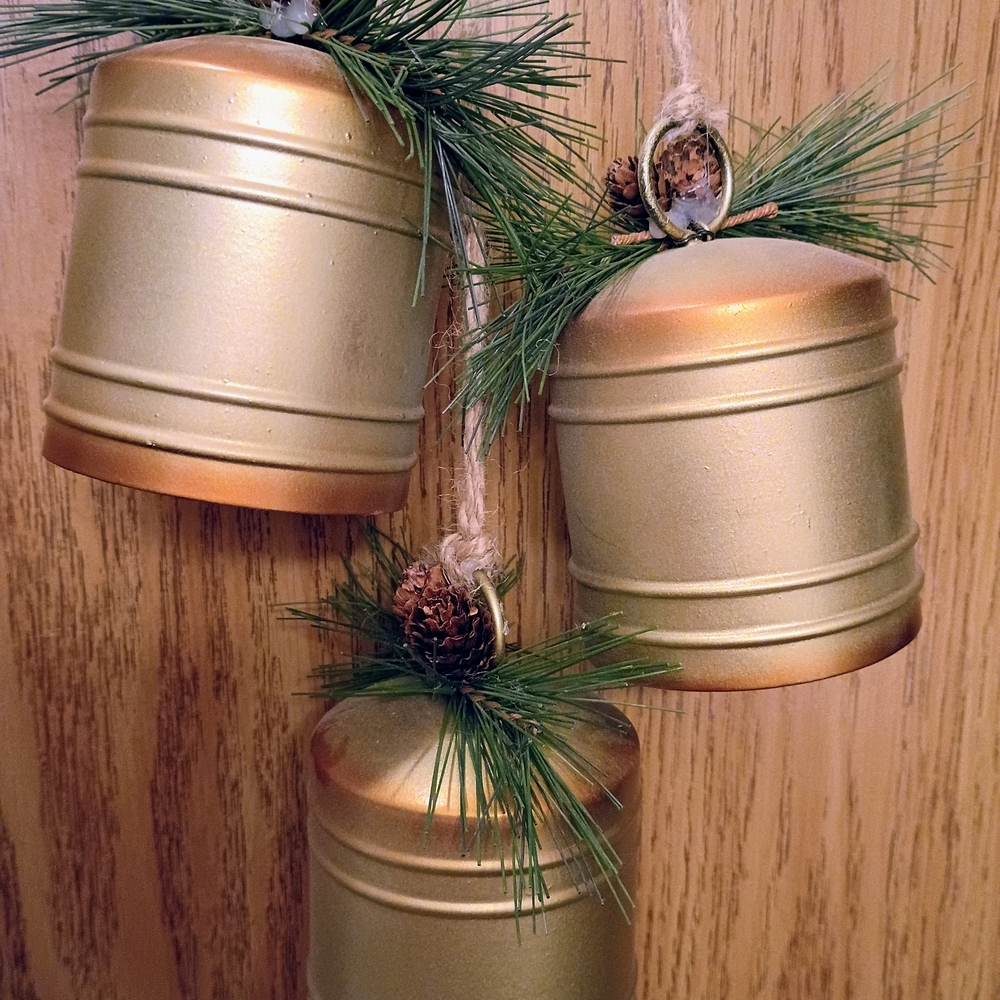 Source Unknown Gold Bells with Pine and Pinecone Accents